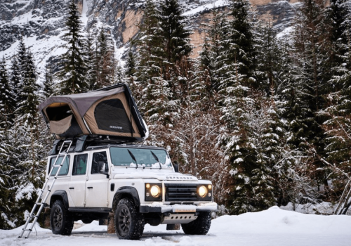 bookara tente de toit sur defender dans neige